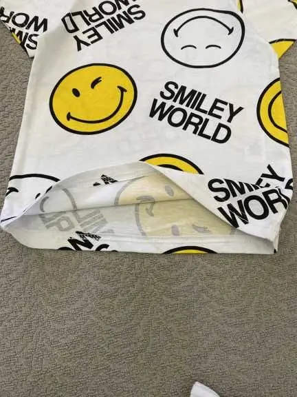 ست تیشرت و شلوارک بچگانه طرح Smiley World