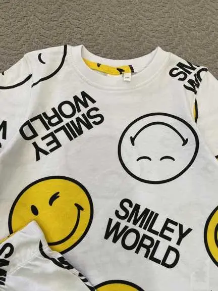 ست تیشرت و شلوارک بچگانه طرح Smiley World
